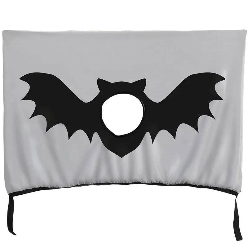 Grey car sun shade curtain with bat pattern and central head hole for dogs, installed on a car window