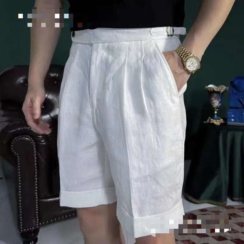 Men's linen blend double waist cuffed shorts in white, side view showing cuffed hem and relaxed fit