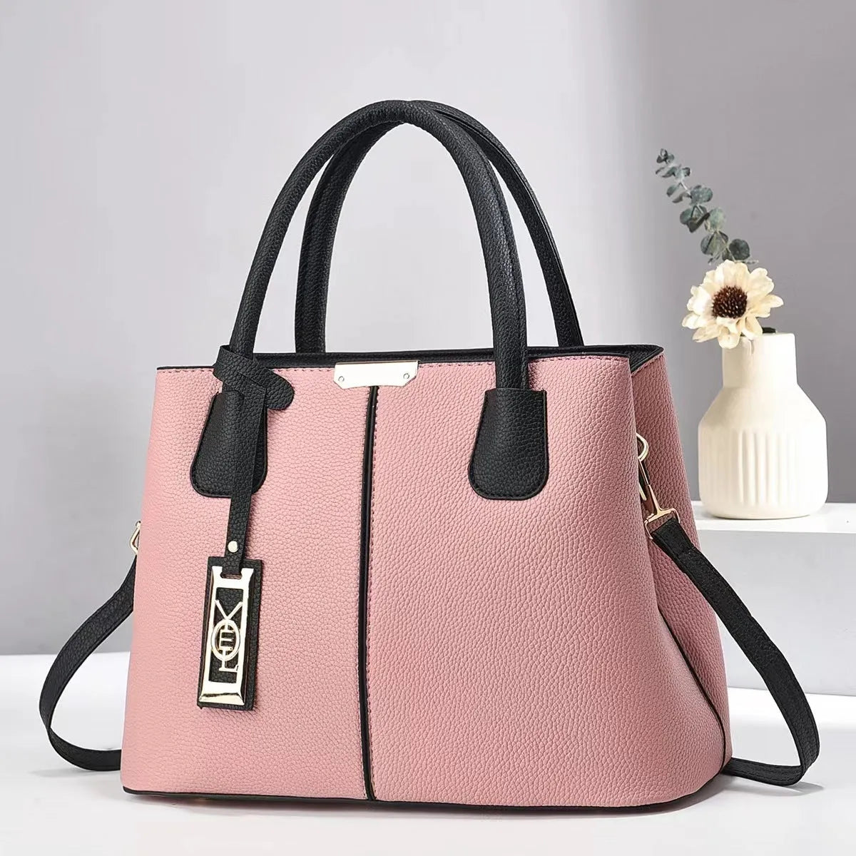 Women's large capacity shoulder bag in soft PU leather with adjustable strap and multiple colour options