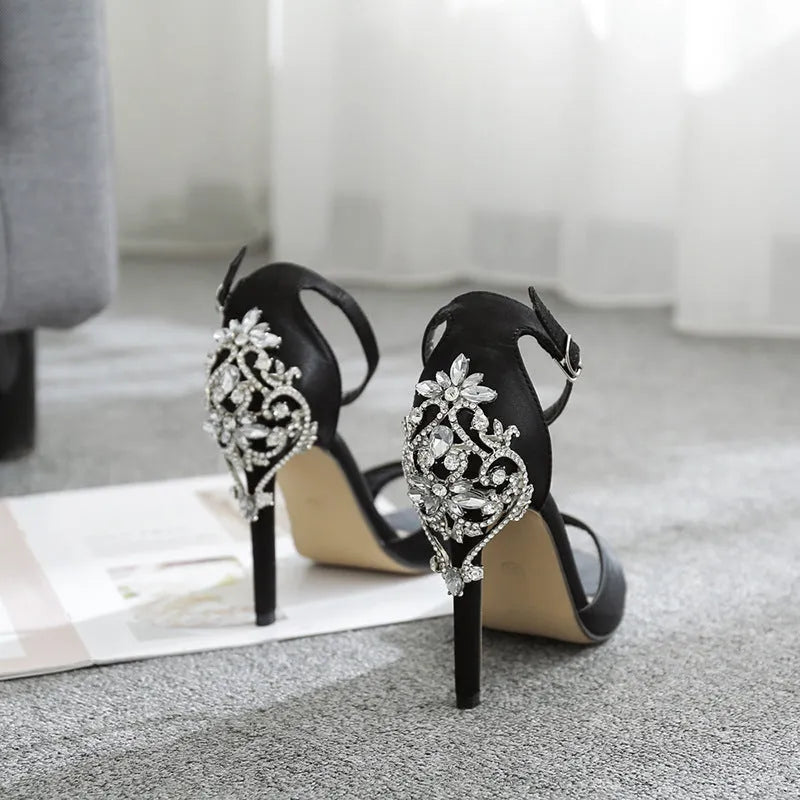 Black suede women's high heel shoes with rhinestone details and fish mouth toe on rubber sole