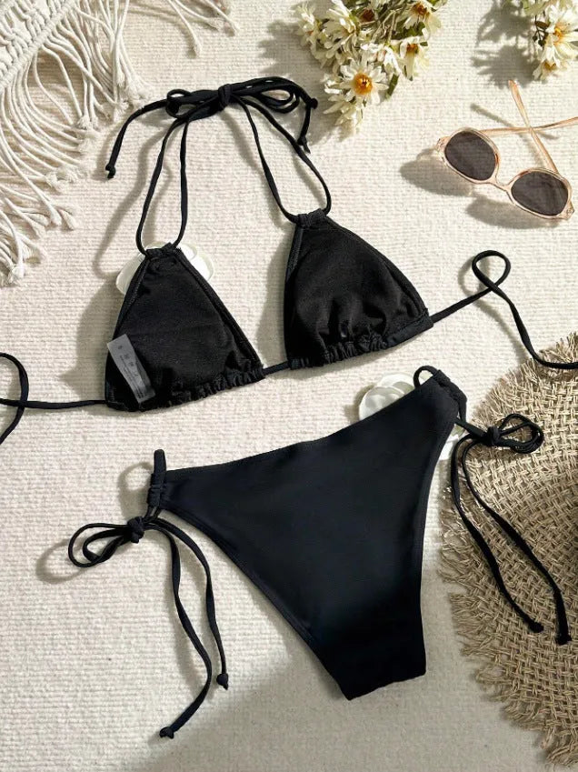 Black women's bikini swimsuit with 3D flower pattern and drawstring lace detailing on two-piece swimwear