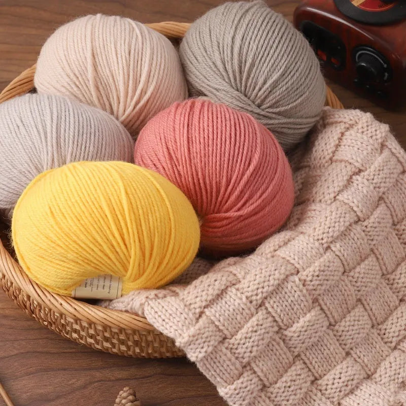 A single roll of hand-knitting wool yarn in a colour choice from over 30 options, for making baby clothes.