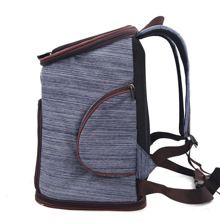 Blue pet dog backpack made from Oxford cloth and hexagonal mesh, designed for carrying small pets up to 15 jin
