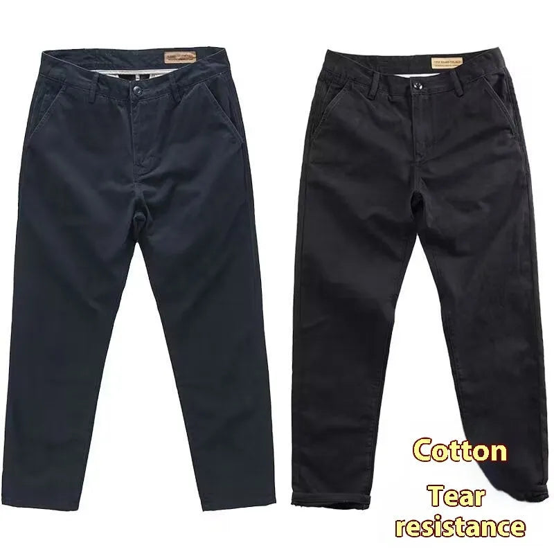 Men's slim fit casual trousers in grey with a straight leg design, made from a micro-elastic fabric blend.