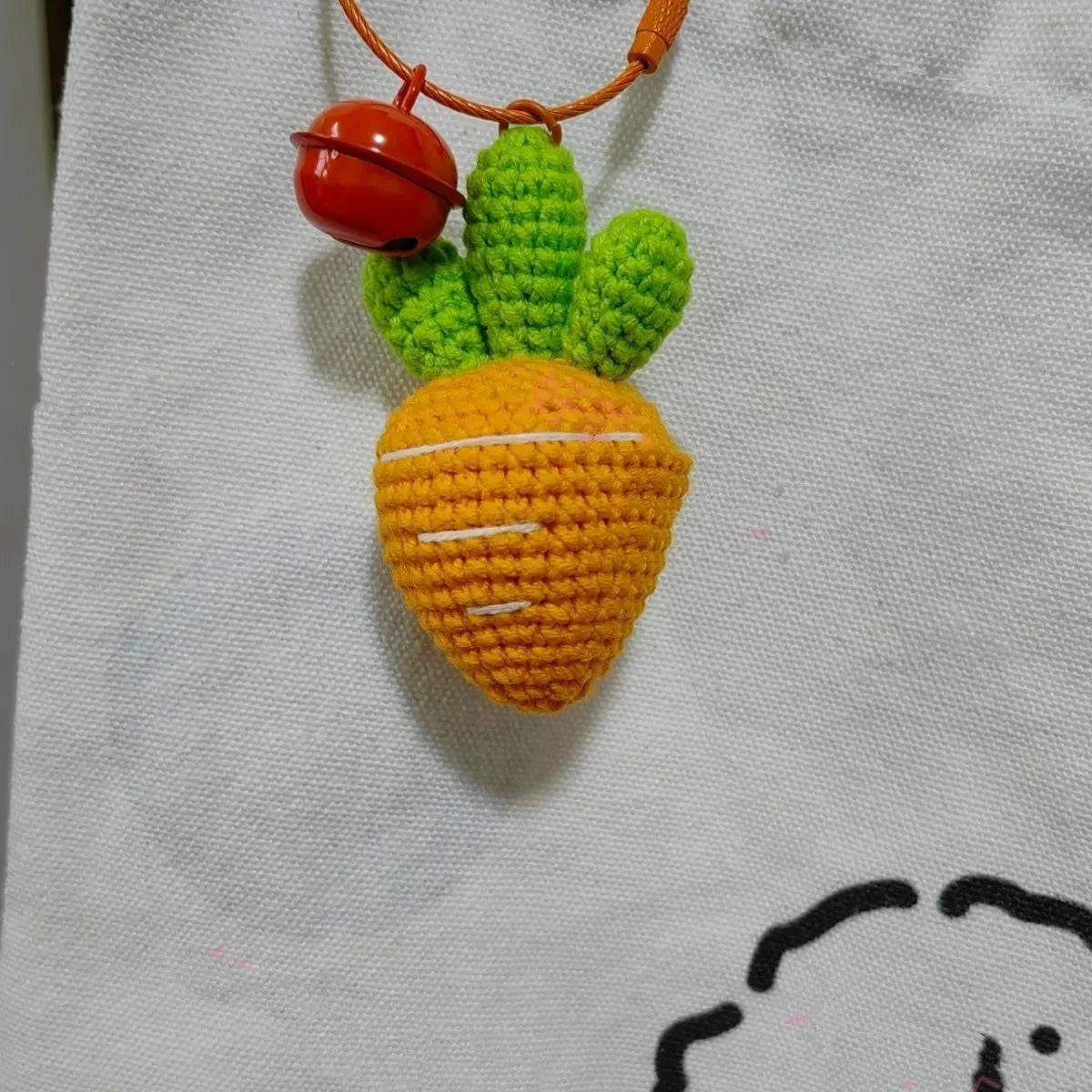 Soft wool cartoon carrot keychain pendant on a 15cm rope.