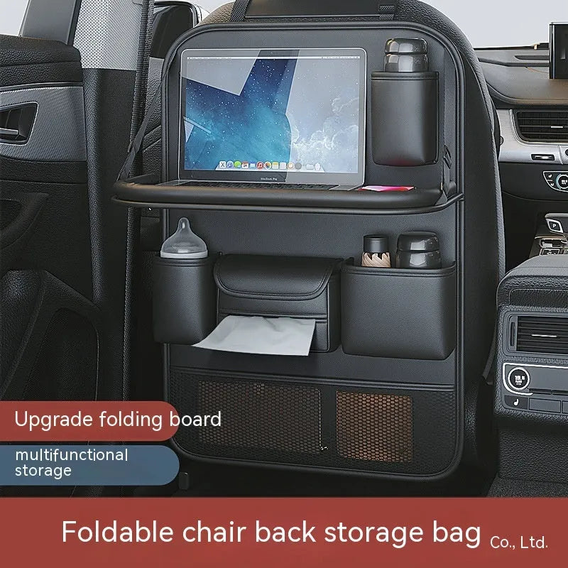 Leather car seat storage bag with carrying handle shown in black, hanging over a car seat.