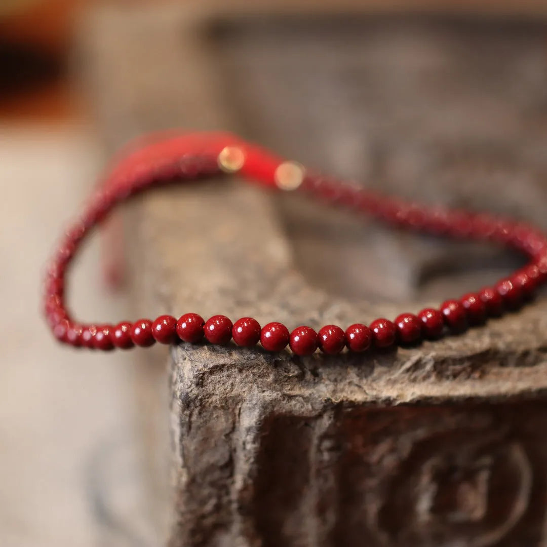 Natural cinnabar bracelet with purple gold sand design and geometric shape featuring auspicious patterns