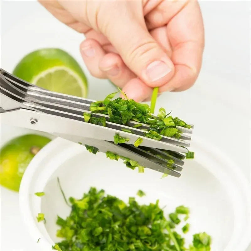 Green stainless steel multi-blade herb scissors with V-shaped design for cutting nori and green onions.