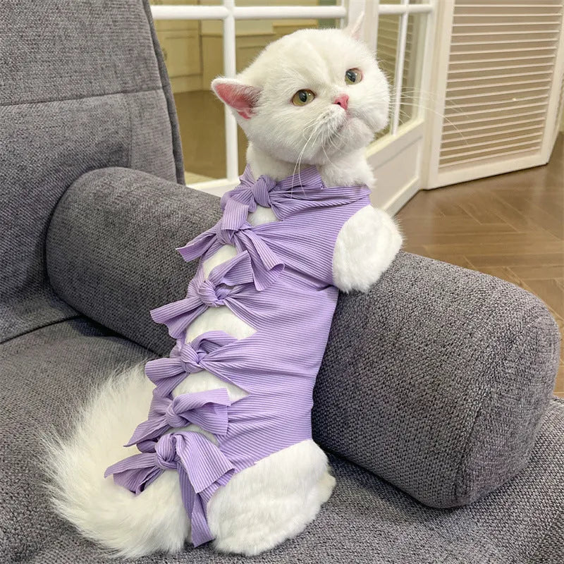 Blue lace-up polyester sterilisation clothing for a cat, shown on a size chart for S, M, and L.