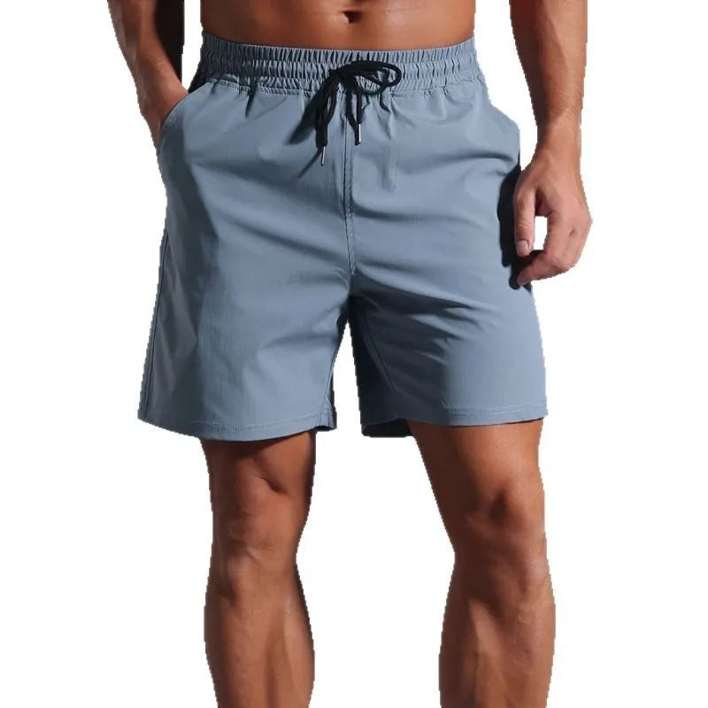 A pair of men's loose-fit casual shorts in a straight cut style, shown in one of the available colours.