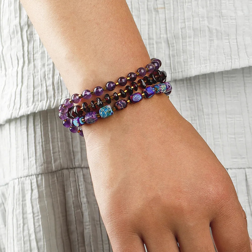 Purple amethyst round beads geometric bracelet with garnet accents and textured detailing