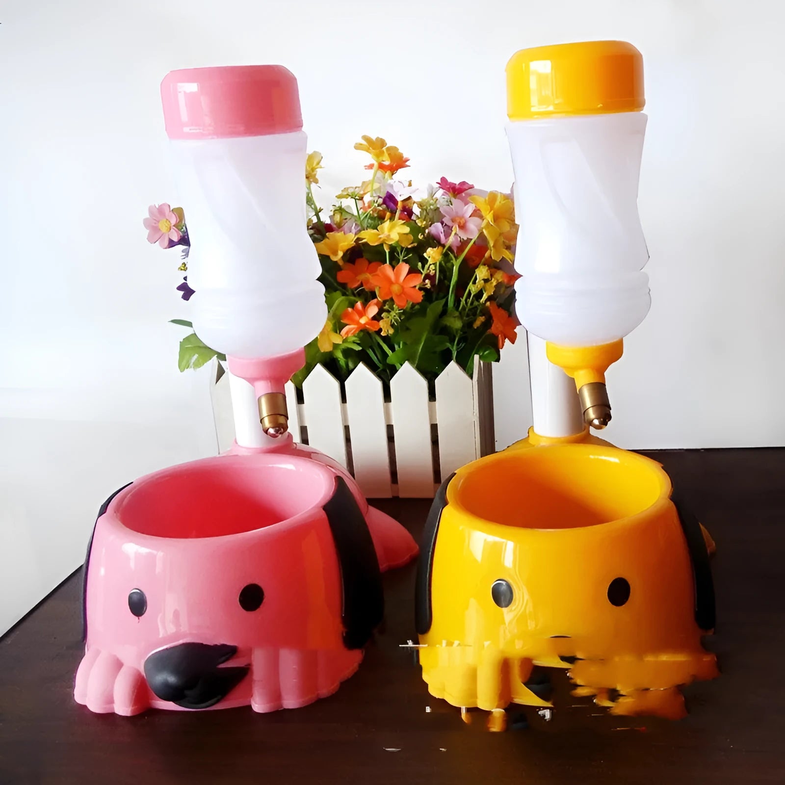 Adjustable height pet drinking bowl with rod mechanism in blue, pink or yellow colours