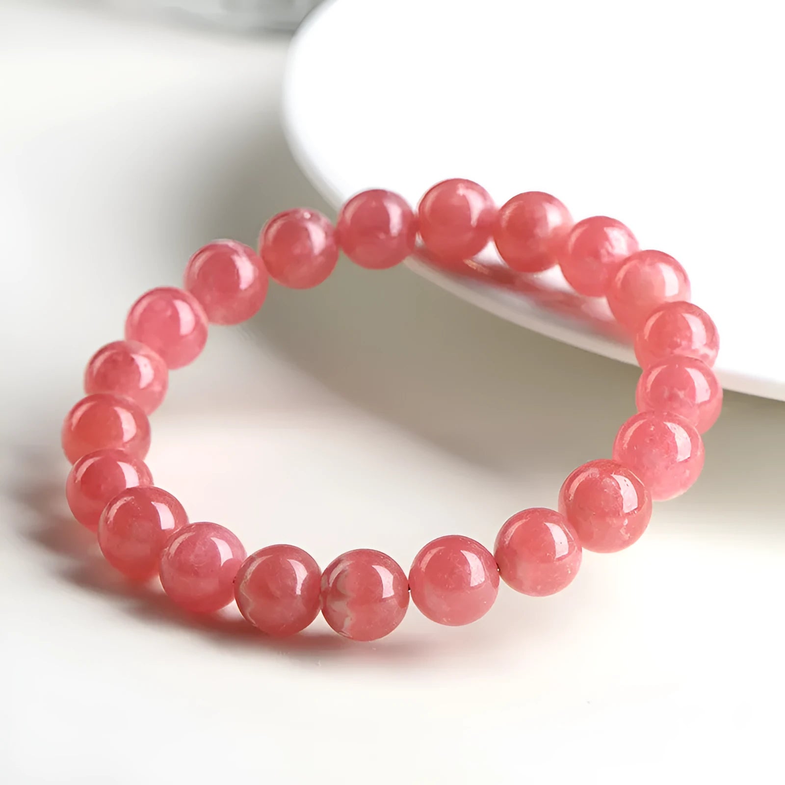 Geometric crystal bracelet with longevity lock closure in rhodochrosite colour variations