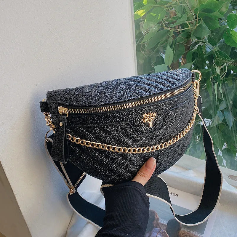 Women's one-shoulder chain crossbody bag in white PU with sandwich pocket and zipper change bag on a model