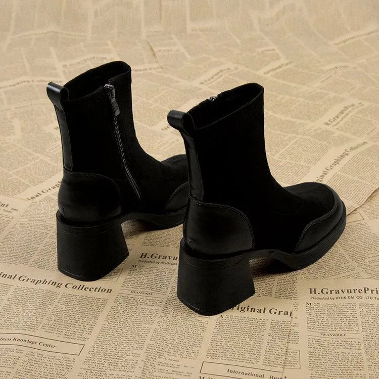 Thick bottom chunky heel Martin boots for women in black with lace-up fastening and rubber sole