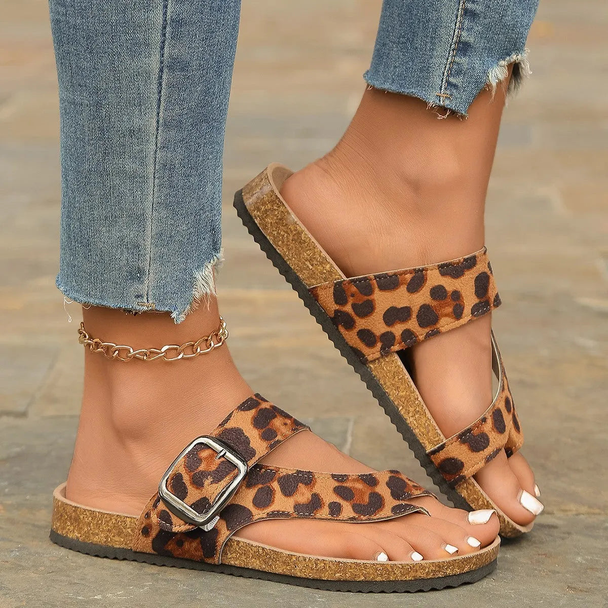 Roman style leopard print slippers with round toe covering and wooden sole