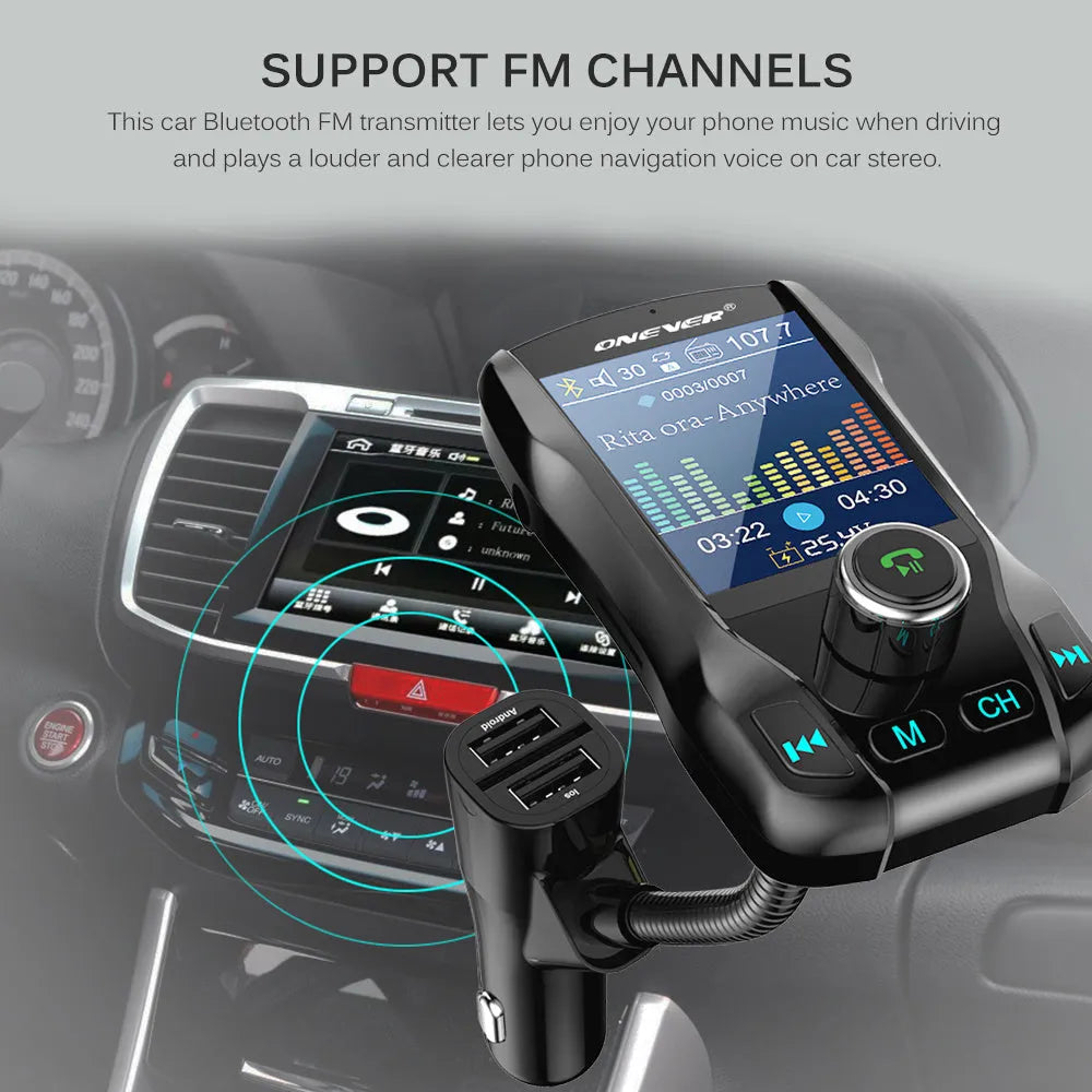 Black Bluetooth car FM transmitter with colour screen and dual USB ports plugged into a car dashboard.
