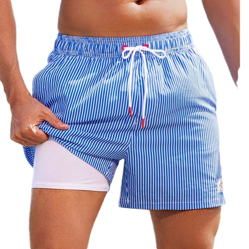 Men's loose fit quick-drying boxer swimming trunks in a selection of floral and tropical print designs.