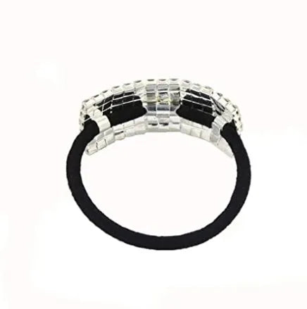 Three silver hair rings with rhinestone crystals on a light background