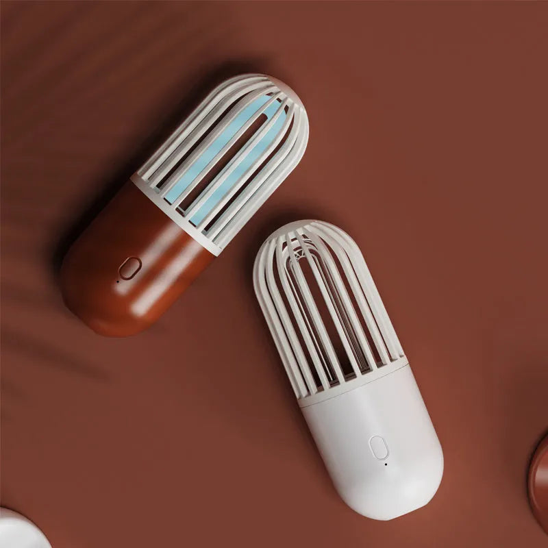 Portable capsule-shaped ultraviolet UVC disinfection lamp in choice of colours.