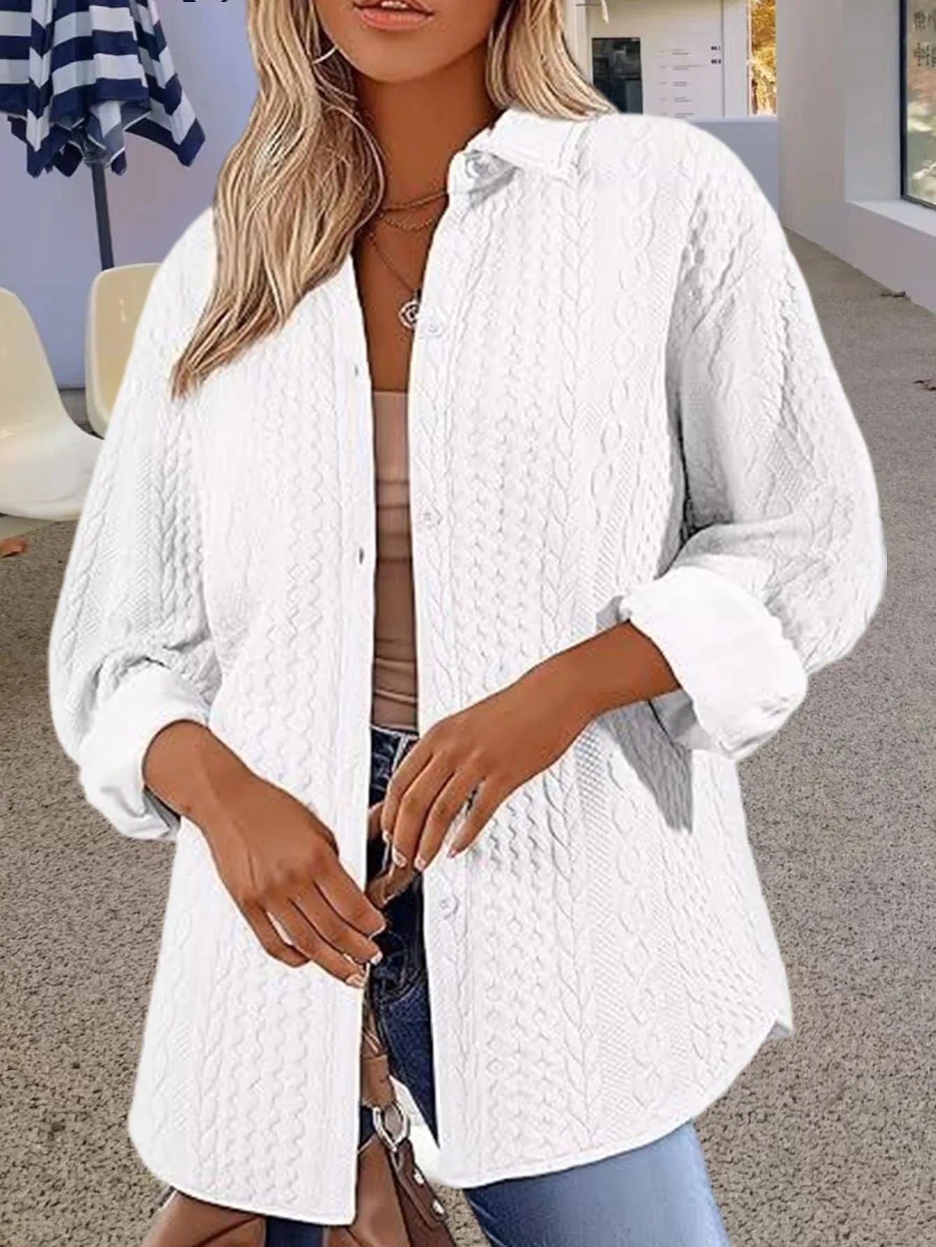 Women's solid colour knitted polyester cardigan sweater in black, shown in a cardigan style with long sleeves.