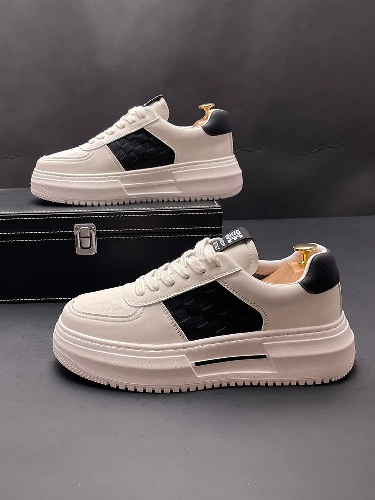 White, green and black sports casual shoes with cloth upper and rubber foam sole showing heel lift insert option