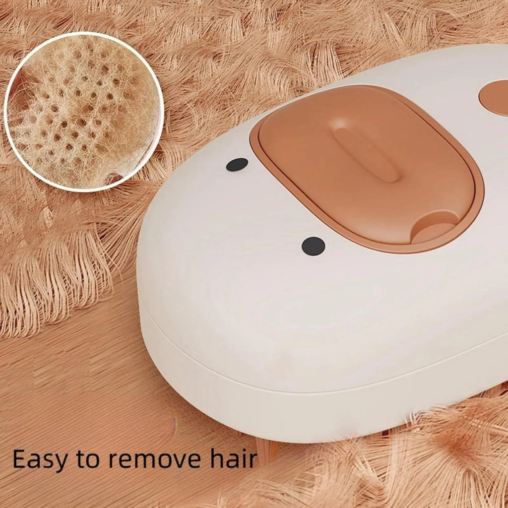 White and yellow rechargeable steam brush for grooming dogs and cats