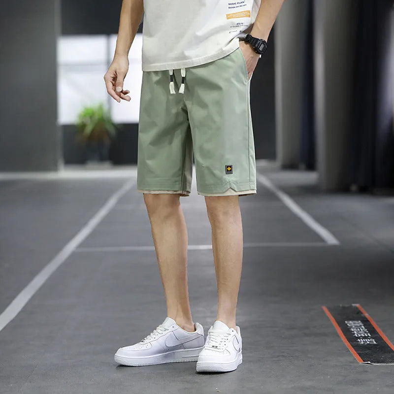 Straight loose casual beach shorts in micro-elastic polyester fabric available in multiple colours