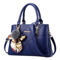 Large horizontal square women's handbag with car suture detail and zipper closure in white