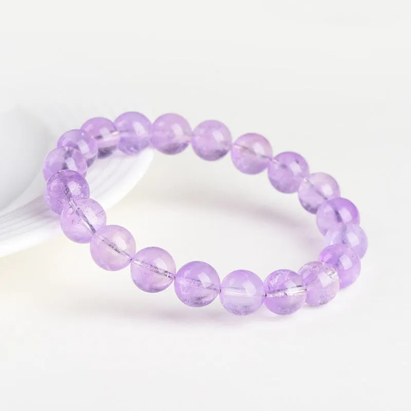 Lavender amethyst crystal bracelet with round beads in water ripple geometric design