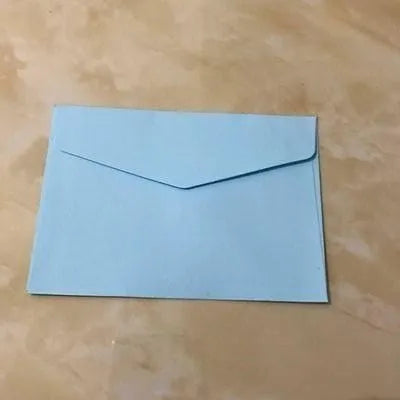 Mini coloured envelopes in assorted colours showing 11.5cm by 8cm dimensions and western-style flap
