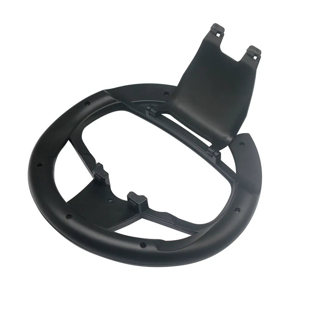 Black ABS PS5 steering wheel attachment clipped onto a SONY PS5 controller for racing games