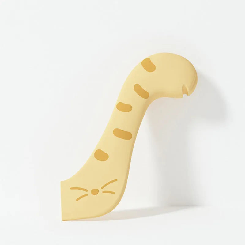 Silicone pet food mixing spoon and flexible can sealing lids in grey, pink and yellow colours.