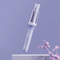 Blue automatic curling iron with 32mm tourmaline ceramic barrel and negative ions