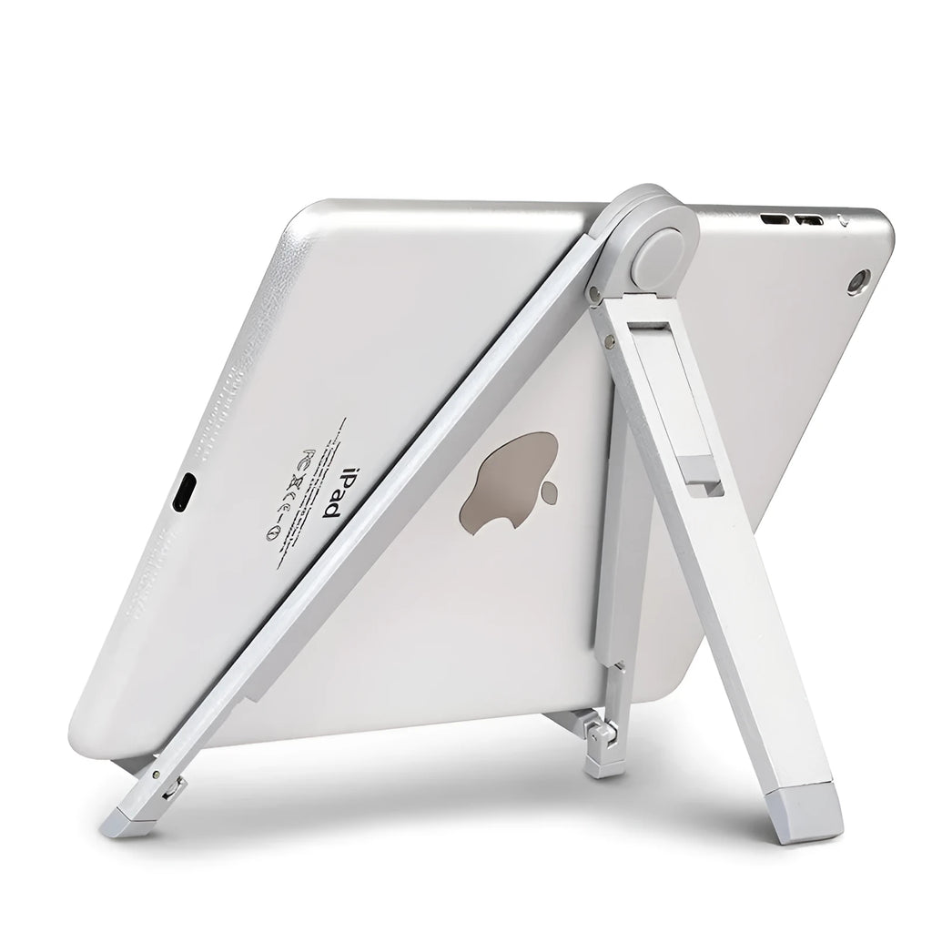 Silver metal adjustable triangle stand holding a mobile phone on a flat desktop