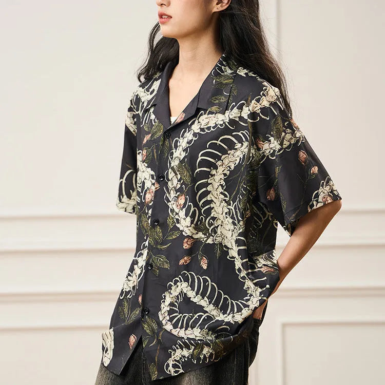 Short sleeve Cuban collar shirt with a printed snake bone and floral pattern in a loose fit.