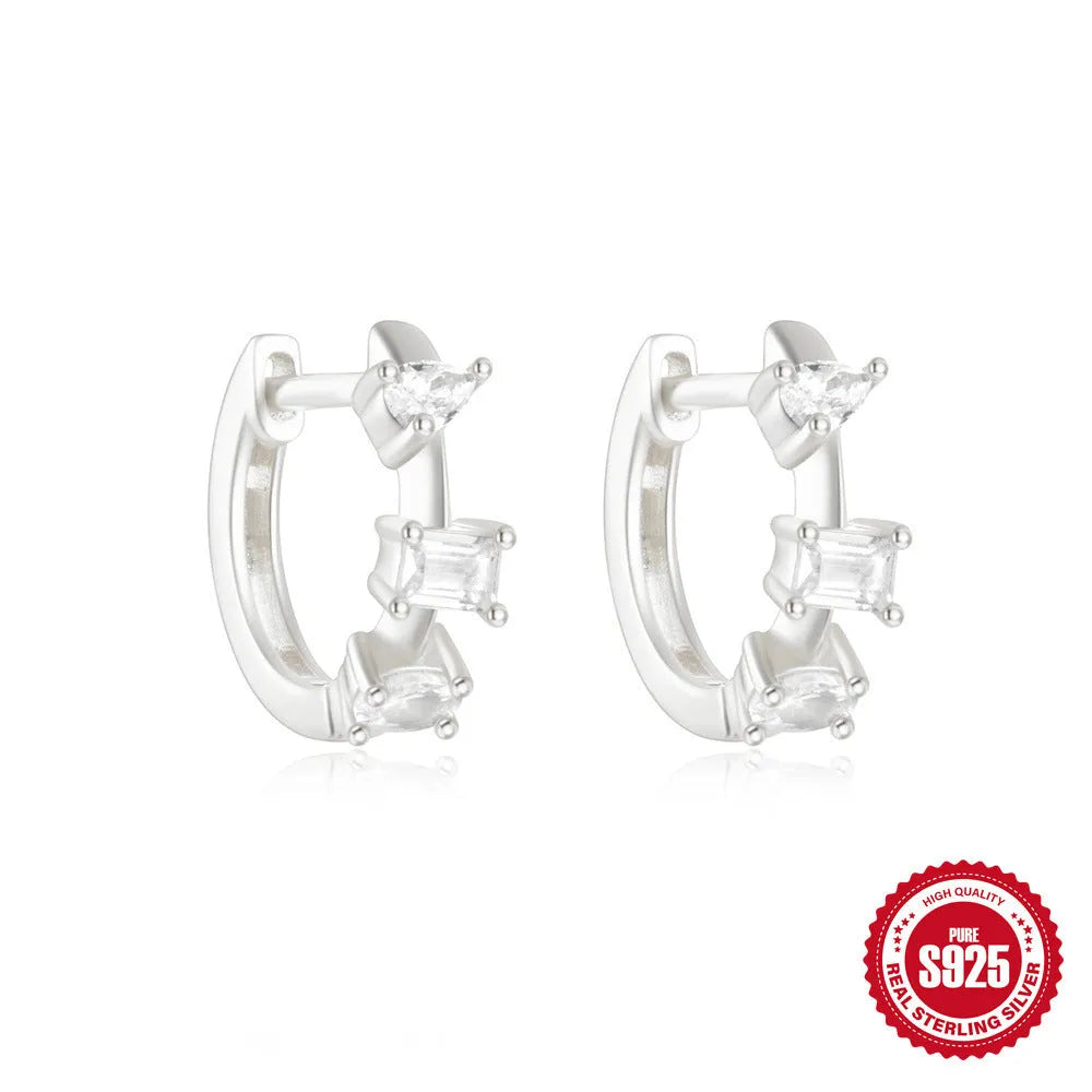 Small round geometric sterling silver stud earrings with diamond accents in gold or silver finish