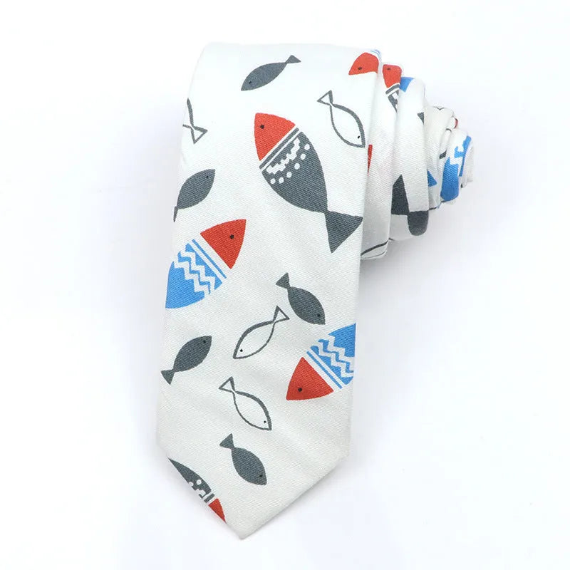Narrow Korean style cotton bow tie with a printed cartoon pattern in various colours.