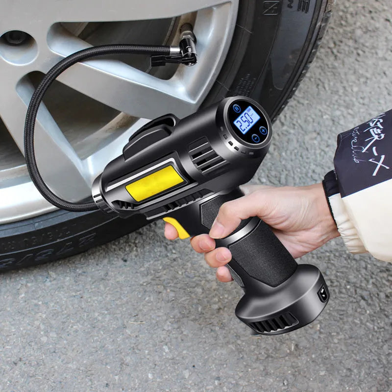 Black wireless electric tire air pump with digital display, showing dimensions and included USB cable and air nozzles.