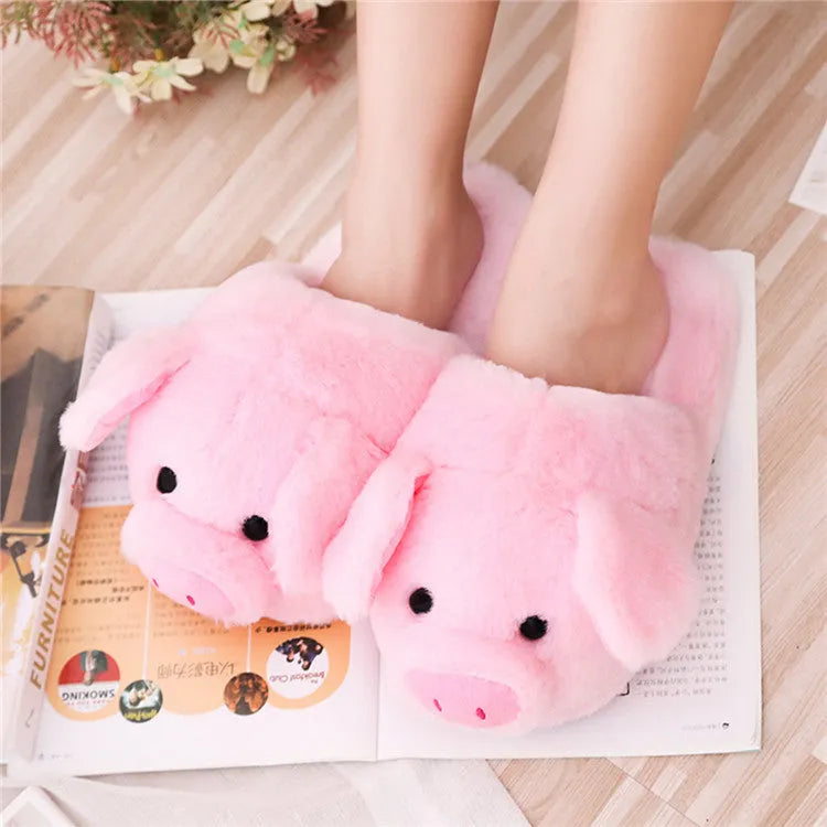 Pink pig plush floor slippers with soft short plush material and PP cotton filling.