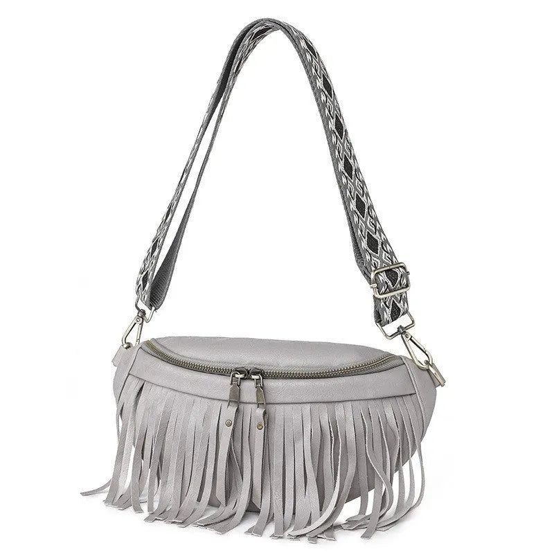 Retro-style pleated messenger crossbody bag in PU leather with a tassel, shown in macaron-gray.