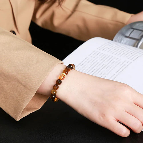 Natural yellow tiger-shaped stone and yellow tower crystal 8mm bead bracelet for women