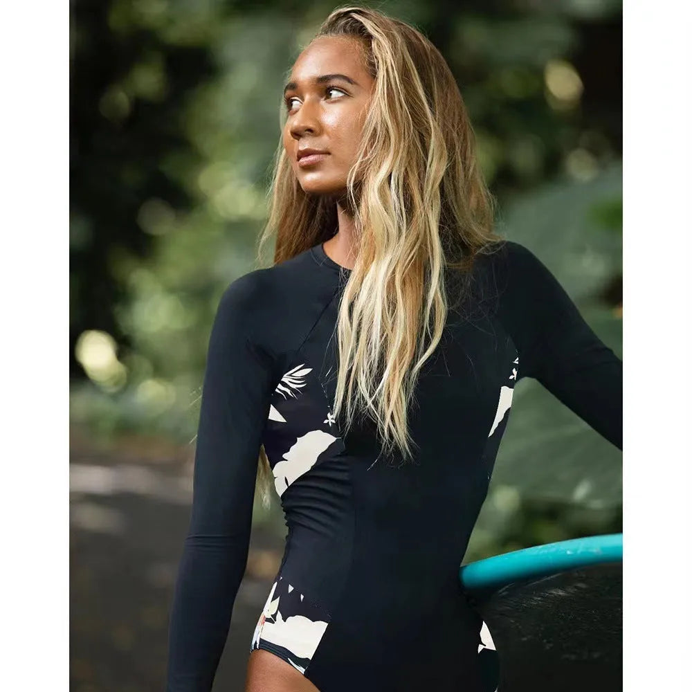 Black women's long-sleeved one-piece diving suit with printed pattern.