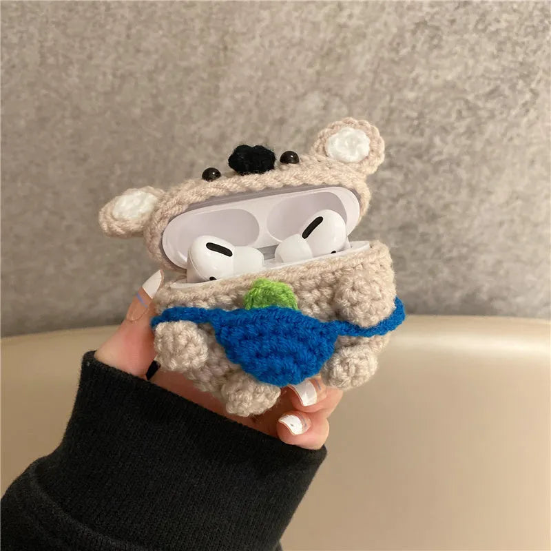 Hand knitted AirPods protective sleeve with koala bear backpack design on Apple AirPods case
