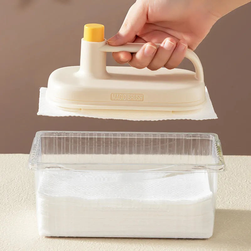 Disposable Magic Brush cleaning tool with plastic handle and stack of 50 white non-woven fabric refill rags.