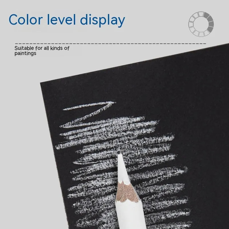 Three white charcoal pencils with wooden casings for sketching and highlighting on dark paper