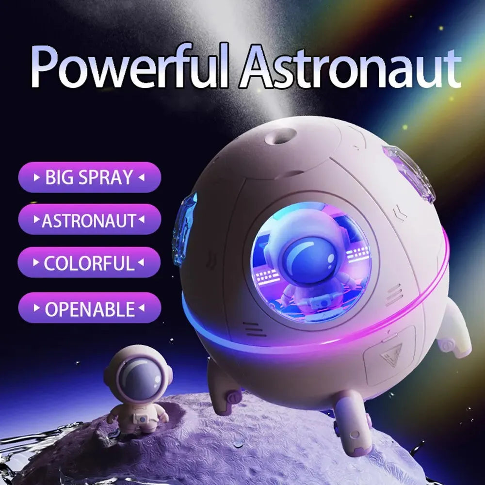 Light purple astronaut-shaped USB desktop humidifier with LED light on a desk