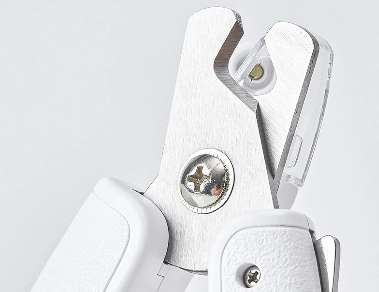 White LED pet nail clipper for cats and dogs with transparent anti-splash guard and file.