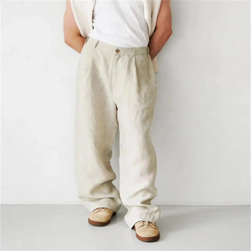 Men's loose high-waist linen jogger pants in a straight-leg cut, shown in a neutral colour.