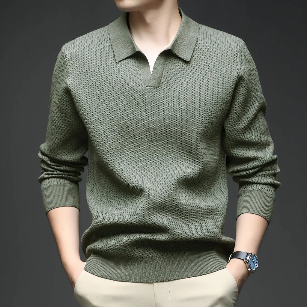 Men's loose fit casual green pullover sweater for autumn layering on a hanger.
